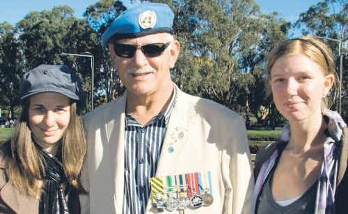 Wayne Schofield with his daughters Shelby, left, and Meredith at last year’s Anzac Day March. Wayne Schofield with his daughters Shelby, left, and Meredith at last year’s Anzac Day March.